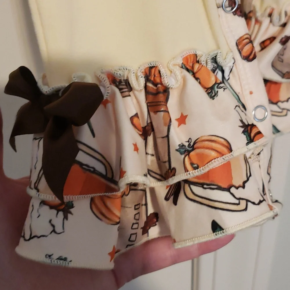 6-12m pumpkin spice graphics ruffle romper